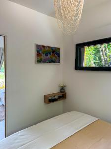 TV a/nebo společenská místnost v ubytování Lodge autour du golf Ardree