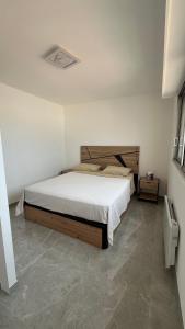 Postel nebo postele na pokoji v ubytování Appartement vue mer