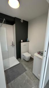 Vannituba majutusasutuses Appartement vue mer