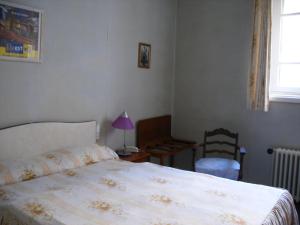 Postel nebo postele na pokoji v ubytování Hôtel Modern