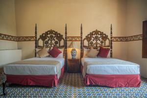 Voodi või voodid majutusasutuse Hotel Montecillo toas