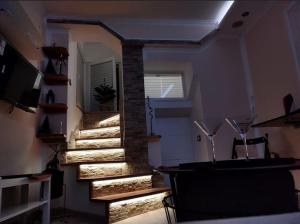 TV i/ili multimedijalni sistem u objektu Megi Zemun Apartment