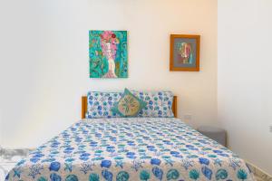 Ένα ή περισσότερα κρεβάτια σε δωμάτιο στο Calle de Las Sirenas +41 φωτογραφίες