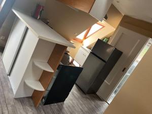 Kuchyň nebo kuchyňský kout v ubytování Appartement Cosy de 2 à 4 pers