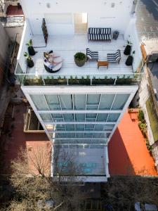 an overhead view of a house with a glass roof at Vain Boutique Hotel in Buenos Aires