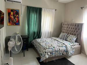 Katil atau katil-katil dalam bilik di Miraph Apartment II