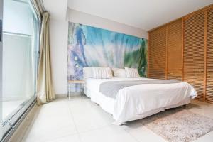 Ένα ή περισσότερα κρεβάτια σε δωμάτιο στο Dream Studios BA