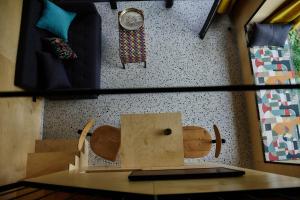 a room with a table with a wooden dog on it at Tri Vile Estate, a piece of paradise in Kozjansko in Podčetrtek +52 photos
