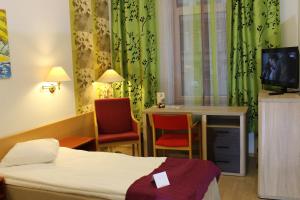 TV a/nebo společenská místnost v ubytování A1 Hotel Riga City Center