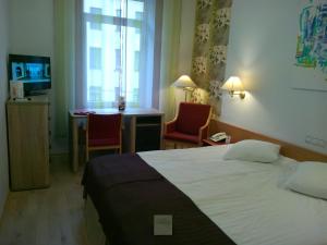 Postel nebo postele na pokoji v ubytování A1 Hotel Riga City Center