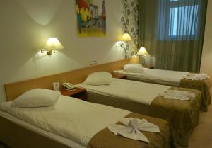 Postel nebo postele na pokoji v ubytování A1 Hotel Riga City Center