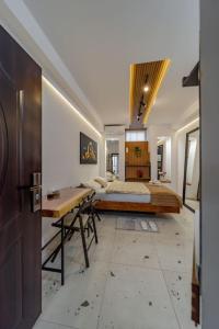 Postel nebo postele na pokoji v ubytování Keti Zemun Spa Apartment