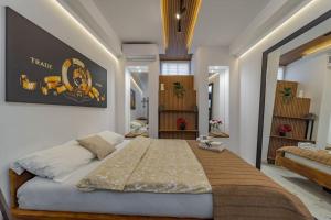 Postel nebo postele na pokoji v ubytování Keti Zemun Spa Apartment