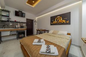 Postel nebo postele na pokoji v ubytování Keti Zemun Spa Apartment