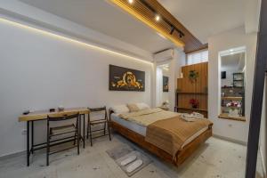 Postel nebo postele na pokoji v ubytování Keti Zemun Spa Apartment