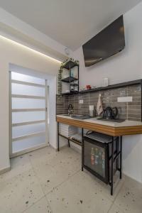 Kuchyň nebo kuchyňský kout v ubytování Keti Zemun Spa Apartment