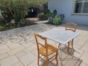 Patio nebo venkovní prostory v ubytování Sable jaune
