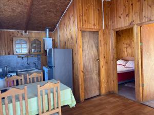 Postel nebo postele na pokoji v ubytování Cabañas la Sebastiana
