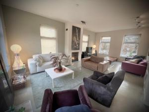 Χώρος καθιστικού στο Luxe vakantievilla met jacuzzi