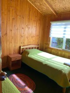 Postel nebo postele na pokoji v ubytování Cabañas la Sebastiana