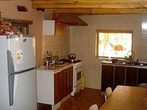 Kuchyň nebo kuchyňský kout v ubytování Hostal Candelaria