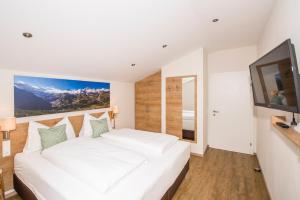 Letto o letti in una camera di Appartements AUSZEIT with private SPA