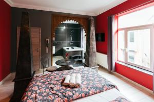 Postel nebo postele na pokoji v ubytování Hotel Riad Nour