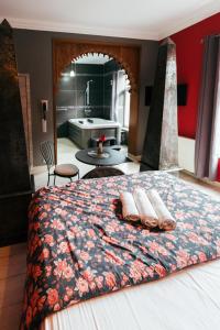 Postel nebo postele na pokoji v ubytování Hotel Riad Nour
