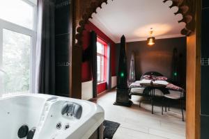 Postel nebo postele na pokoji v ubytování Hotel Riad Nour