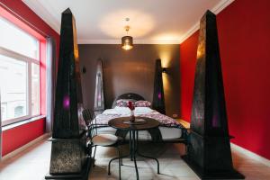 Postel nebo postele na pokoji v ubytování Hotel Riad Nour