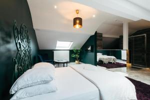 Postel nebo postele na pokoji v ubytování Hotel Riad Nour