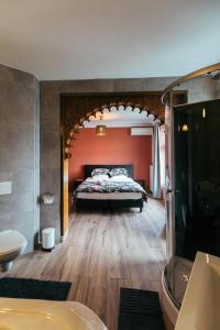 Postel nebo postele na pokoji v ubytování Hotel Riad Nour