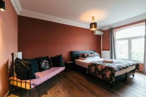 Postel nebo postele na pokoji v ubytování Hotel Riad Nour