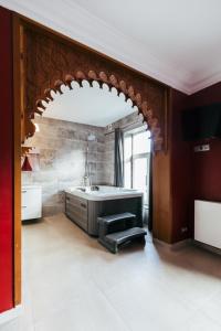 Postel nebo postele na pokoji v ubytování Hotel Riad Nour