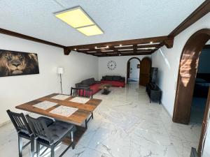 a living room with a table and a couch at TF Schwarzwald in Bad Säckingen