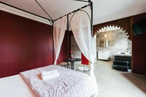 Postel nebo postele na pokoji v ubytování Hotel Riad Nour