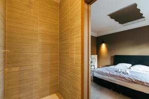 Postel nebo postele na pokoji v ubytování Hotel Riad Nour
