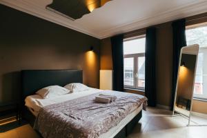 Postel nebo postele na pokoji v ubytování Hotel Riad Nour
