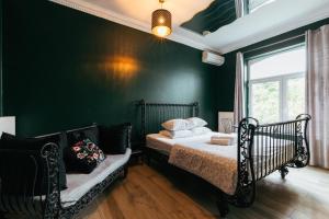 Postel nebo postele na pokoji v ubytování Hotel Riad Nour