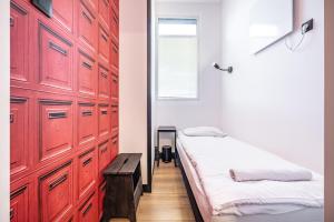 Postel nebo postele na pokoji v ubytování Vola Hostel