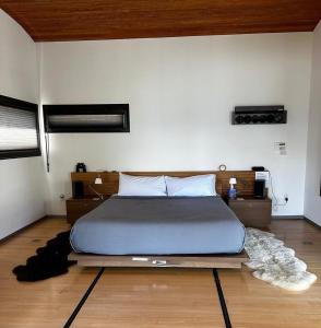 Ένα ή περισσότερα κρεβάτια σε δωμάτιο στο The Villa on the Bay