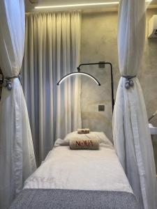 Postel nebo postele na pokoji v ubytování Lala's Boutique Hotel + 26 fotografií