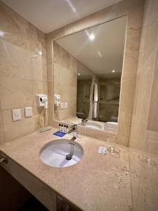 Ванная комната в Hotel Stella Maris +28 фотографий