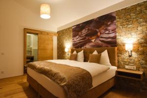 Łóżko lub łóżka w pokoju w obiekcie Luxusapartment Müllerhaus