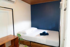Postelja oz. postelje v sobi nastanitve Nao Hostels Playa Venao