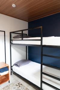 Postelja oz. postelje v sobi nastanitve Nao Hostels Playa Venao