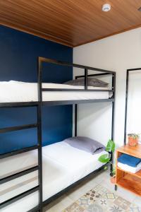 Postelja oz. postelje v sobi nastanitve Nao Hostels Playa Venao