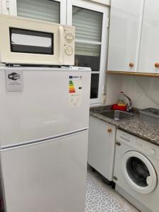 Kuchyň nebo kuchyňský kout v ubytování Atico en el casco histórico