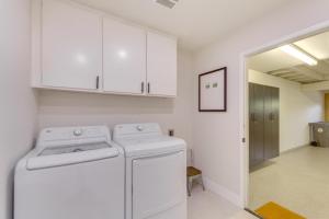 a white washer and dryer in a room at Rancho Mirage Condo Near El Paseo and The River! in Rancho Mirage