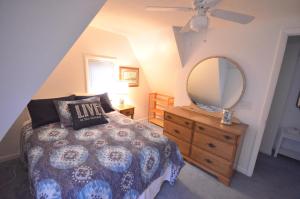 Katil atau katil-katil dalam bilik di Northport Village Hideaway